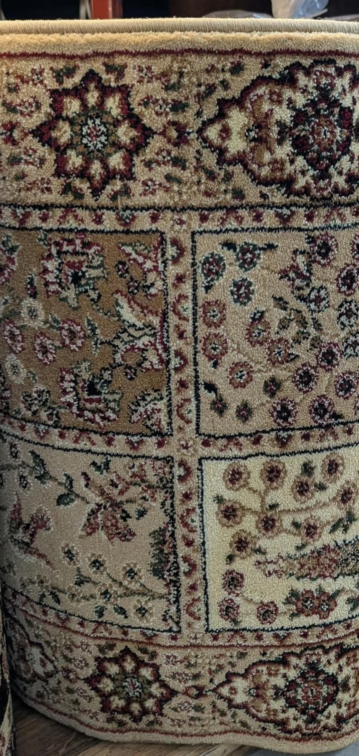 Rouleau du tapis de passage Antalia beige en magasin