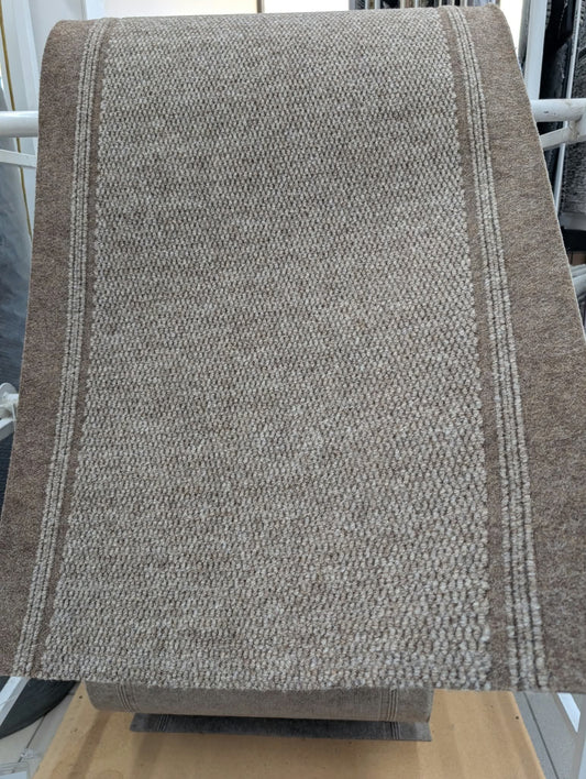 Tapis de passage Gold Medallion déroulé en magasin