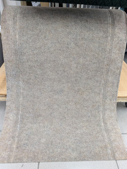 Tapis de passage Marathon déroulé en magasin