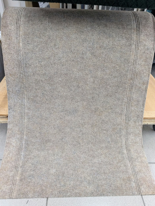 Tapis de passage Marathon déroulé en magasin