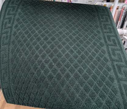Tapis de passage Pacesetter vert déroulé en magasin
