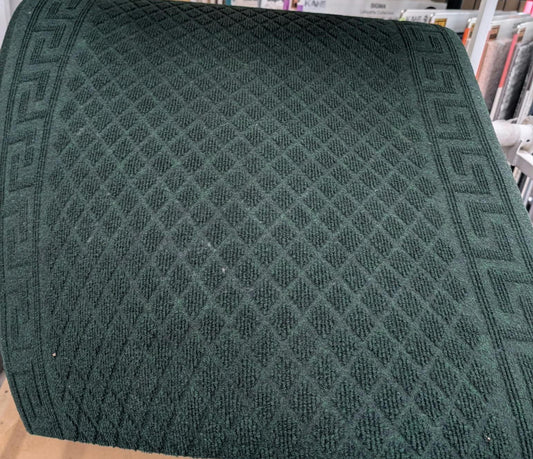 Tapis de passage Pacesetter vert déroulé en magasin