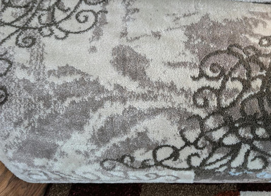 Rouleau du tapis de passage Symphony arabesques en magasin